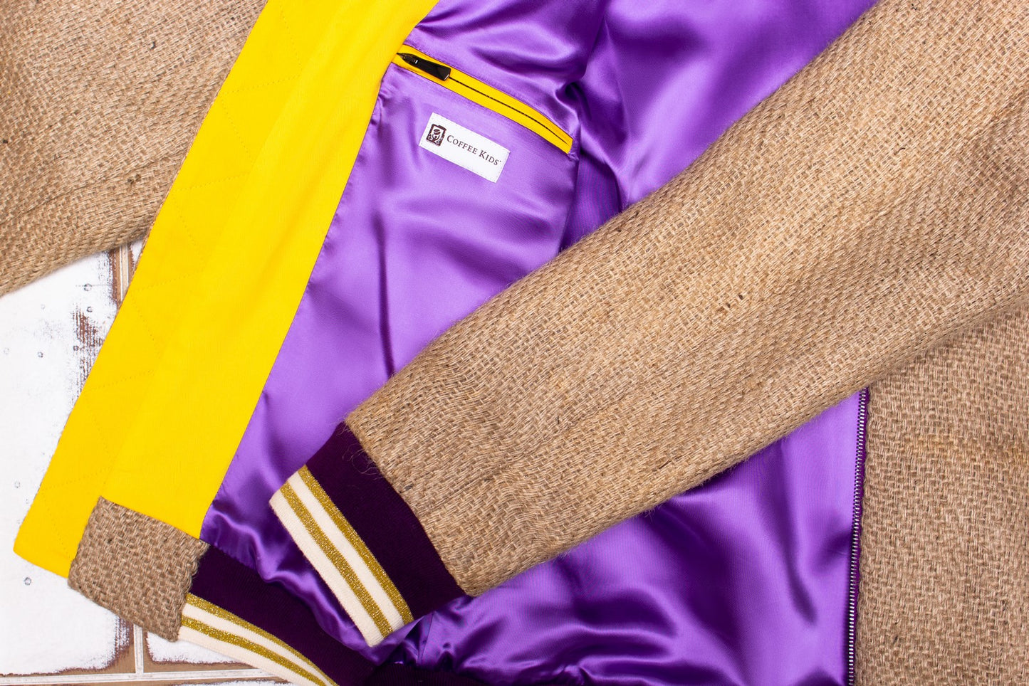 Brightly coloured inside of a men`s one-of-a-kind outerwear made from coffee sacks by a sustainable fashion brand THE COFFEE JACKET®